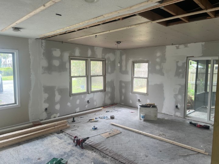 New drywall hung, taped and floated in the Waverly GA living area during the interior renovation